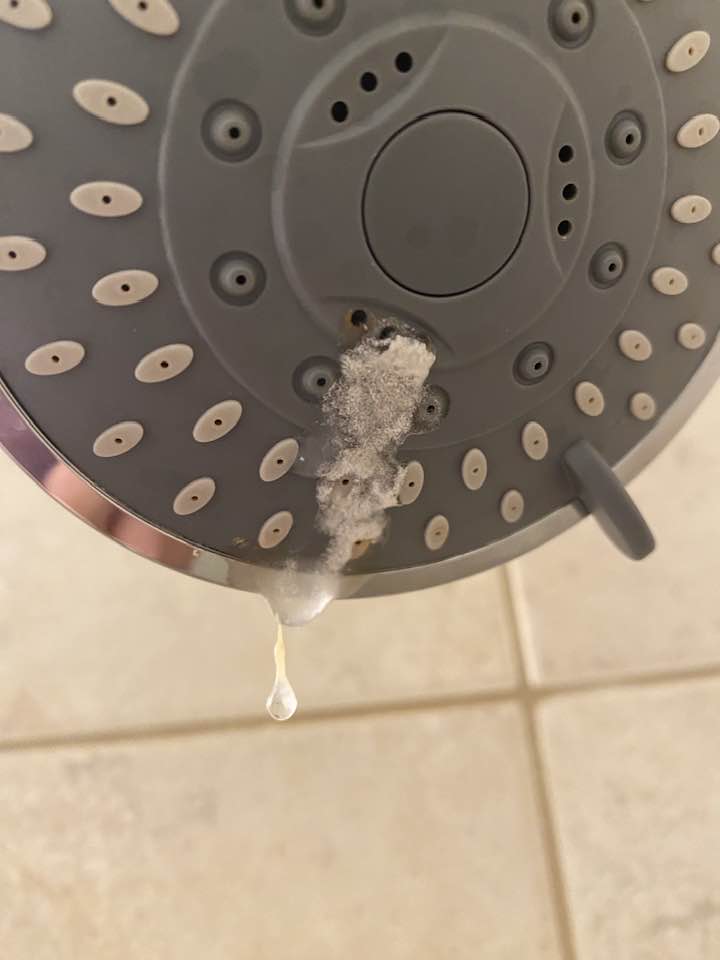 how the hard water stains start on shower head